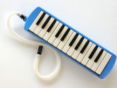 14883935 - blue and white pianica blow-organ